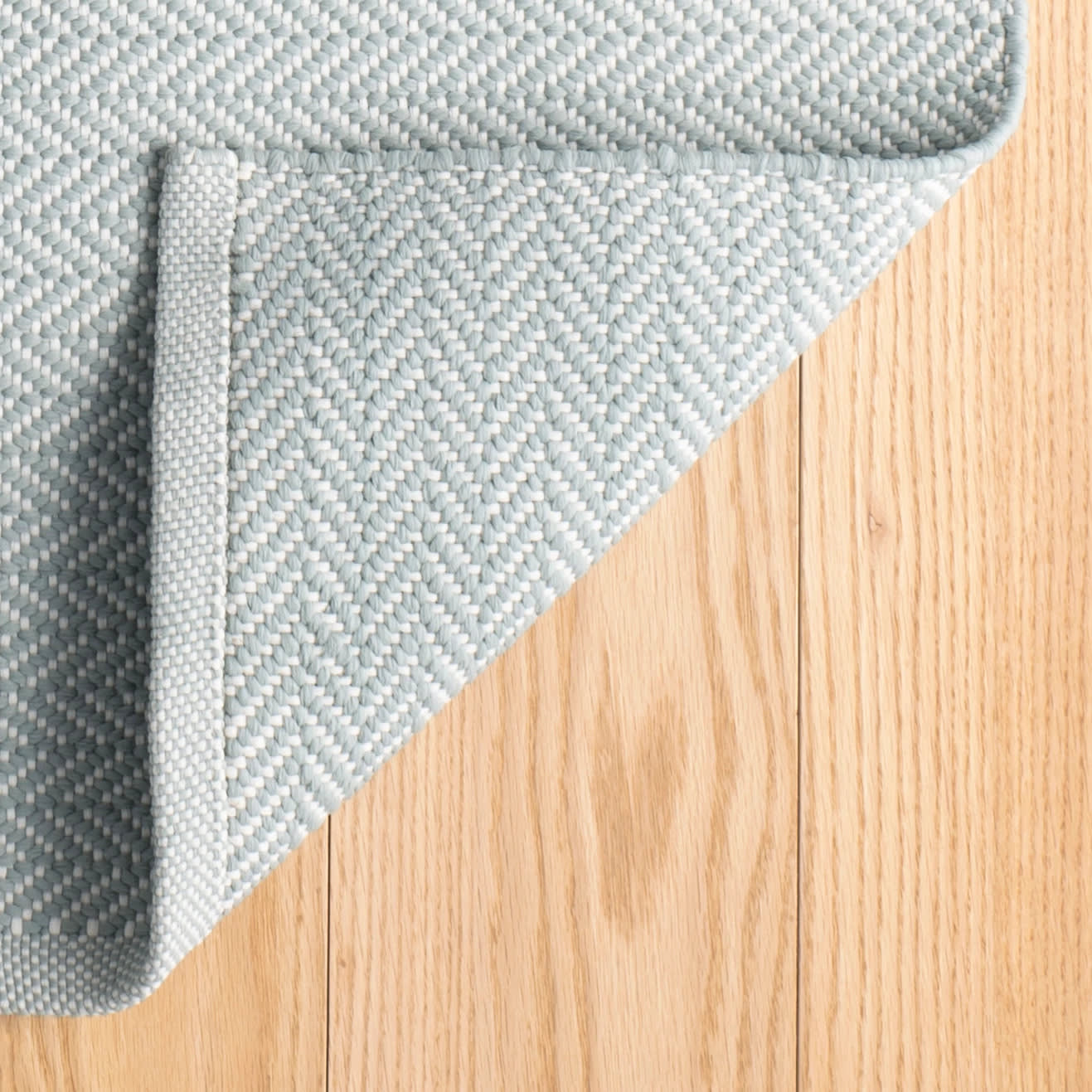 herringbone handwoven indoor/outdoor rug | light blue/ivory herringbone handwoven indoor/outdoor rug | light blue/ivory