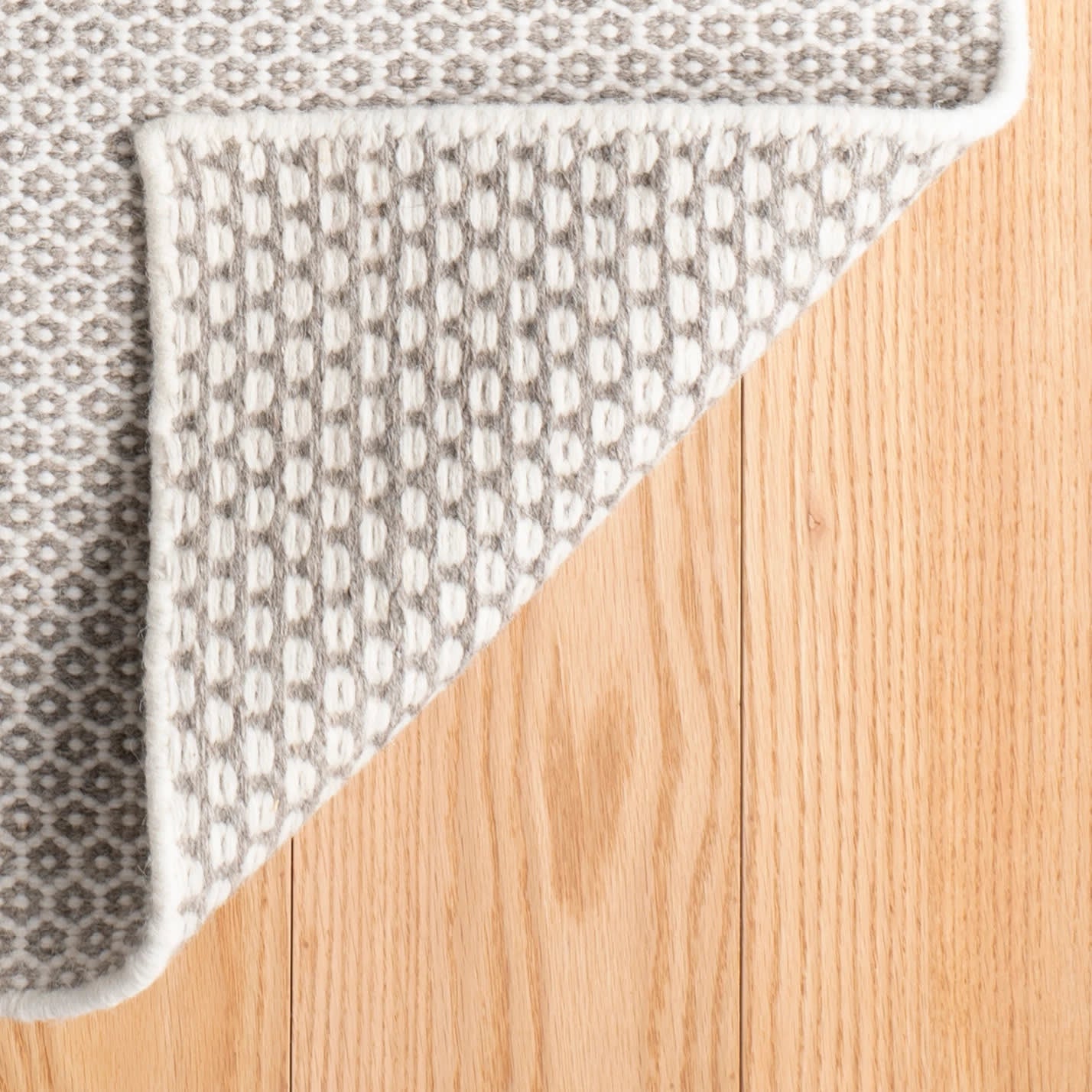 honeycomb handwoven wool rug | ivory/grey honeycomb handwoven wool rug | ivory/grey